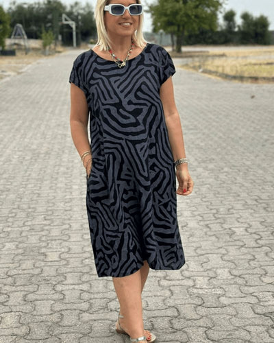 Felly | Sommerkjole med rund hals og smukt print